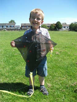 A youngster with his kite